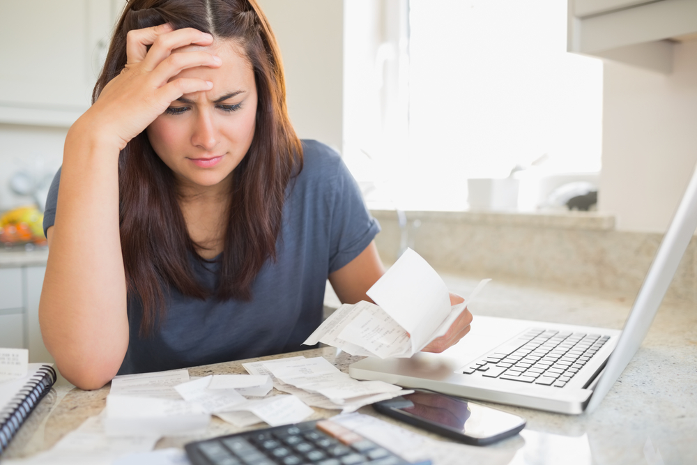 woman with so many bills